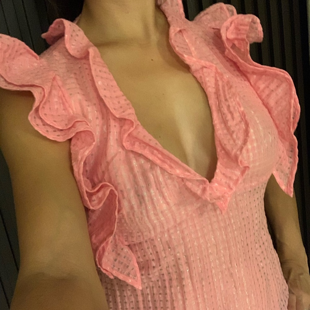 Ruffled neckline and shoulder pink top